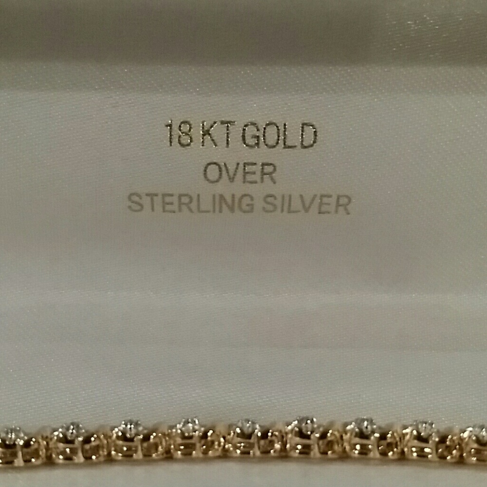 18 k over sterling silver tennis bracelet